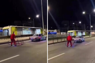 Papai Noel inova no transporte e surpreende motoristas na avenida Cristiano Machado, em BH